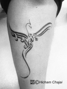 Fénix- Diseño de tatuaje árabe por Hicham Chajai con caligrafía árabe